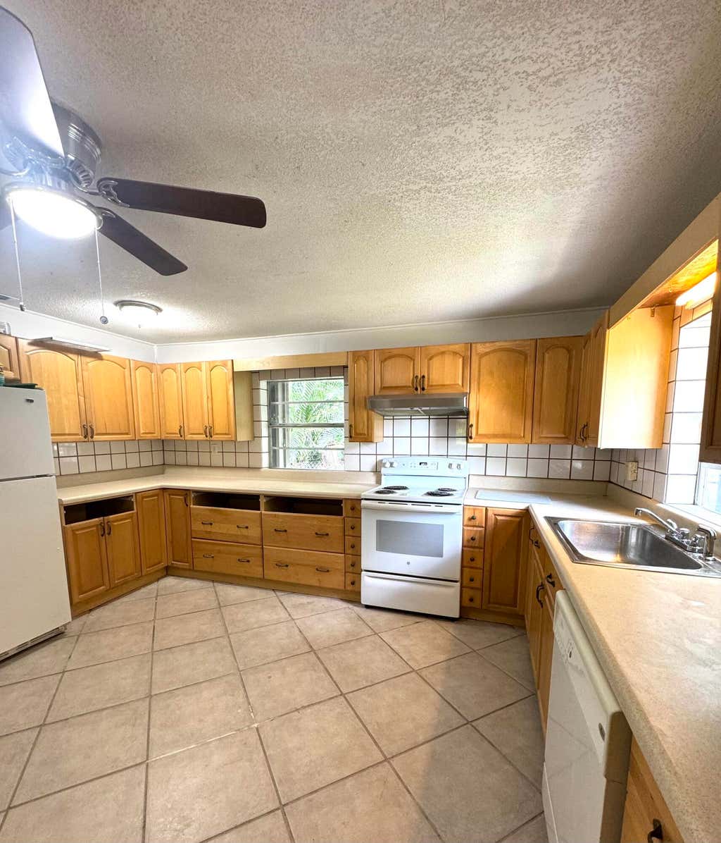 Photo of 1901 S 34th Street, Fort Pierce, FL 34947 (MLS # B26040750)