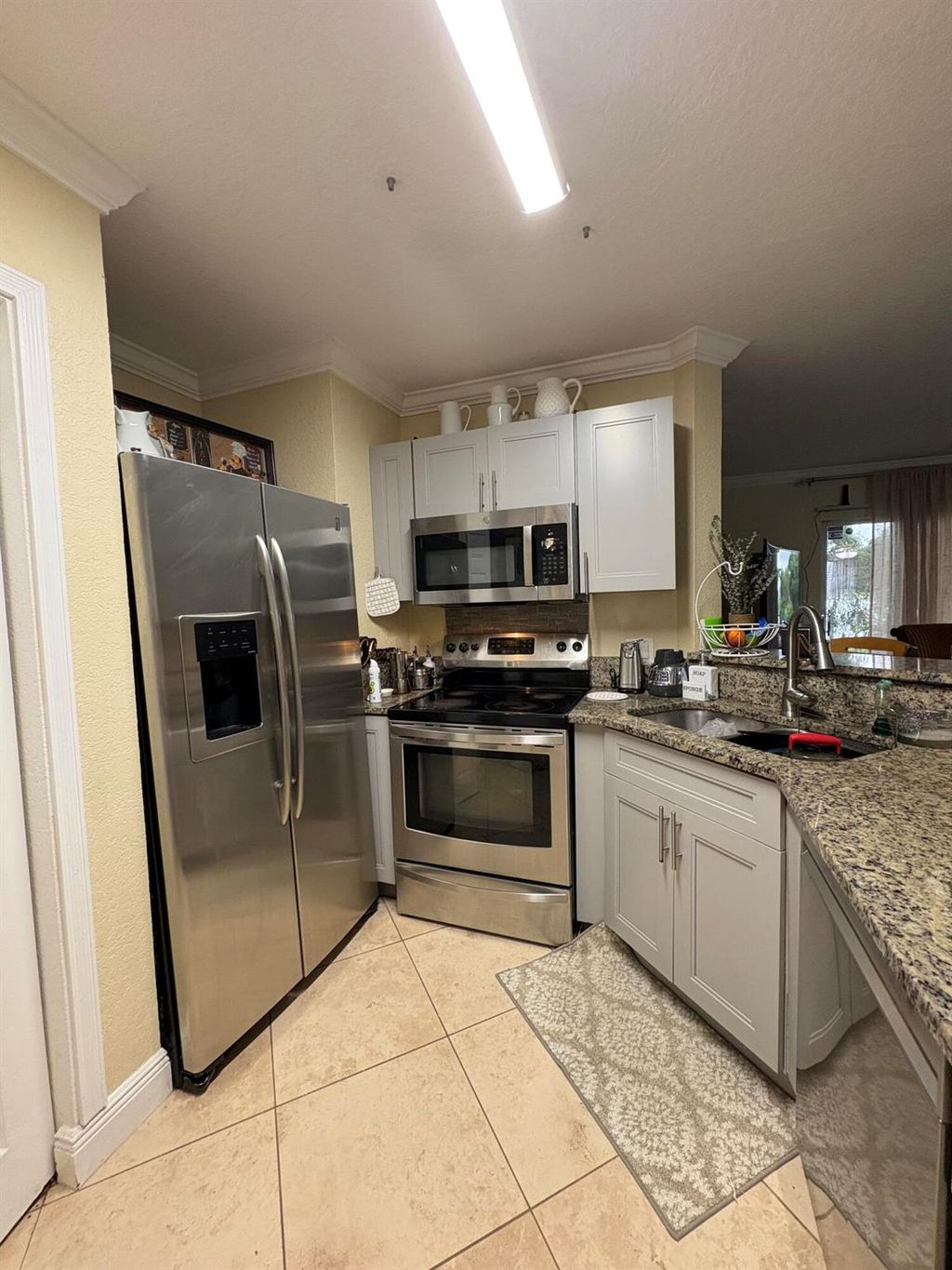 Photo of 3401 NW 44 Street #103, Oakland Park, FL 33309 (MLS # R11129940)