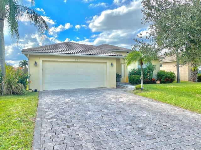 Photo of 591 NW Waverly Circle, Port Saint Lucie, FL 34983 (MLS # R10777785)