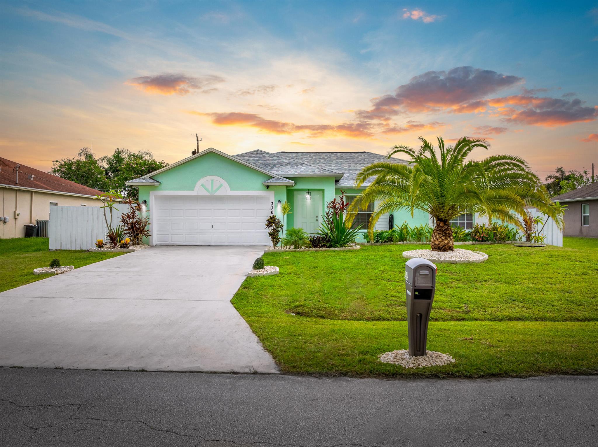 Welcome Home to a beautifully renovated 4/2 CBS Tropical Family Retreat! Featuring Modern Upgrades as well as a Brand-New Roof and 5 Year Craftsmanship Warranty transfered to new owners! Home features Granite throughout Kitchen and bathrooms, elegant vinyl plank flooring in every bedroom. Completely revamped master and guest bathrooms, brand new 6-inch trim baseboards, fresh paint throughout, even an upgraded RO water purification system paired with a water treatment conditioner for ultimate satisfaction and healthy living.The 2020 AC and 2023 water heater offer peace of mind, while impact French doors open to a fully privacy-fenced yard. Entertain on the expansive 25' concrete patio with pergola, shoot hoops on your basketball court, and store with ease using the garage storage