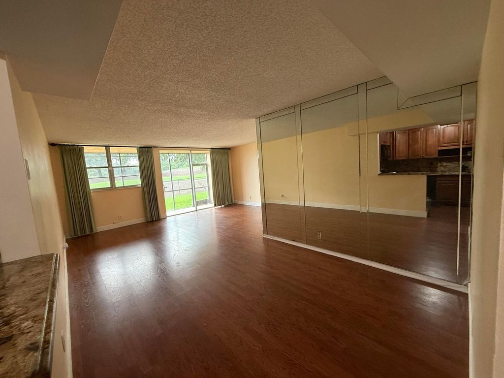 Photo of 3001 W Rolling Hills Circle #108, Davie, FL 33328 (MLS # B26034923)