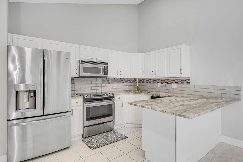 Photo of 5370 Eagle Lake Drive, Palm Beach Gardens, FL 33418 (MLS # R11138032)