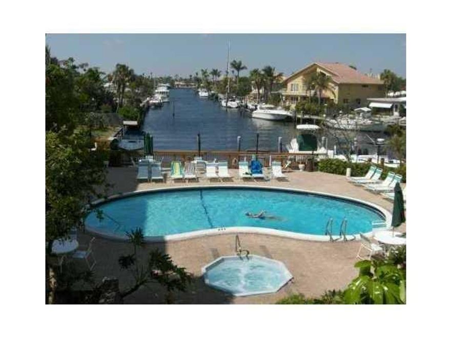 FANTASTIC BEACH RENTAL! REMODELED - NEW TILE THROUGHOUT - NEW PAINT - NEW A/C - IMPACT GLASS WINDOWS - EXTRA LARGE BALCONY.  RESORT STYLE POOL AREA WITH HOT TUB AND BBQ'S - BOAT DOCK AVAILABLE FOR RENT. PRIVATE GATED BEACH ACCESS WITH PARKING, PAVILLION, SHOWERS AND SEVERAL GRILL AREAS. PET FRIENDLY UP TO 15 LBS!