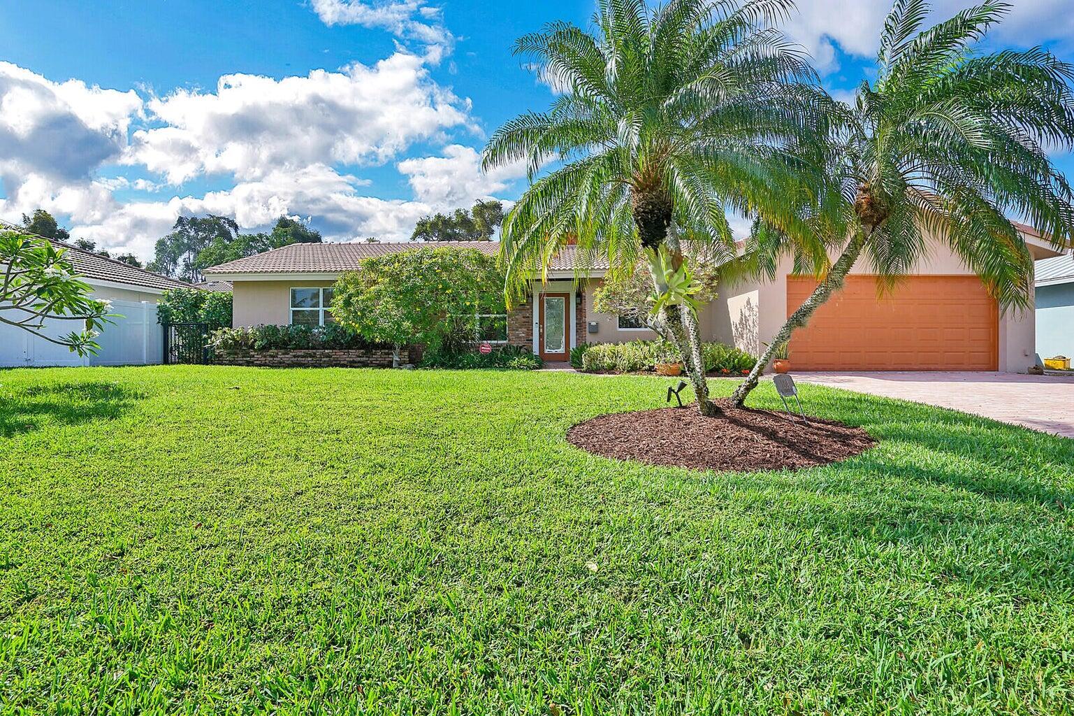 MOVE-IN READY SEPT 1st! Very PRIVATE, beautifully landscaped backyard with large screened patio and pool area for BUG FREE living! Impact glass, full-size laundry room w/tub and additional cabinets. Kitchen has granite counters, tons of cabinets and pantry. All bathrooms are updated. Master has walk-in closet and hardwood floors, French doors to the pool and ensuite bath. 2 car garage, available alarm system, fenced backyard and NO CARPETS! Backs up to Hillsboro Cove. Little Harbor is a small, exclusive enclave, surrounded by water, with homes from $1m to $6m. The location is by far, the best. Little Harbor is across from shopping, restaurants, fitness, walk to famous DEERFIELD BEACH PIER! Freshly painted. Landlord pays lawn care and pool service... HURRY!