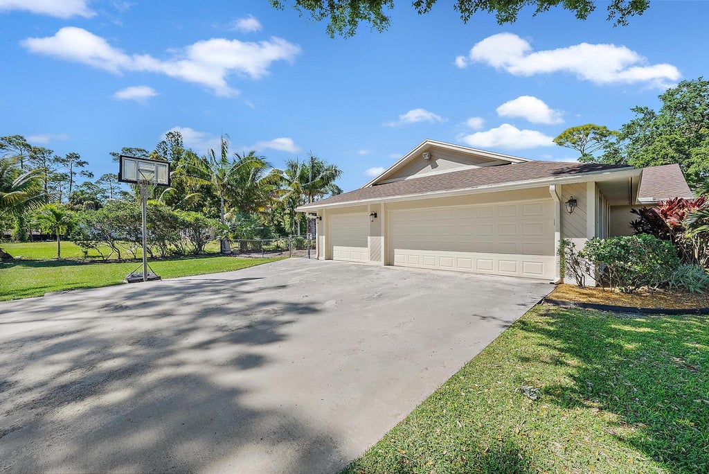 Photo of 4120 Mango Boulevard, The Acreage, FL 33411 (MLS # R11071243)