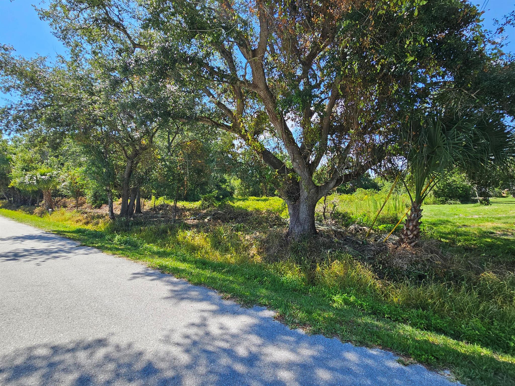 Dixie Ranch Acres~Beautiful 1.99 Acres nestled in a peaceful setting in the heart of Okeechobee County. Located on a paved road, electricity is available. No HOA, minutes from Downtown City of Okeechobee. This lot offers the perfect blend of rural tranquility and accessibility to modern conveniences, a perfect place to build your dream home. Dead-end road, perfectly positioned for your next development. A fantastic choice for those seeking convenience and growth potential. Measurements are approximately.