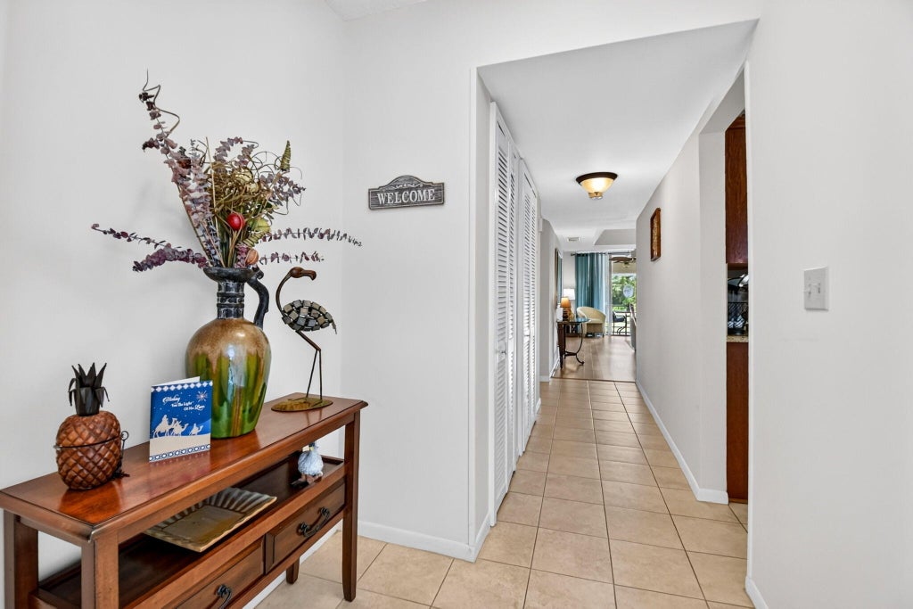 Photo of 3425 Via Poinciana #201, Lake Worth, FL 33467 (MLS # B26058145)