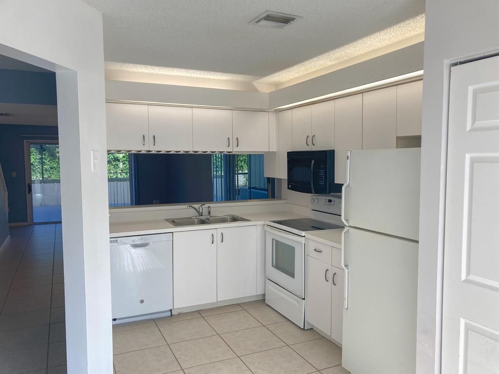 Photo of 6206 Riverwalk Lane Ln #4, Jupiter, FL 33458 (MLS # R10734425)