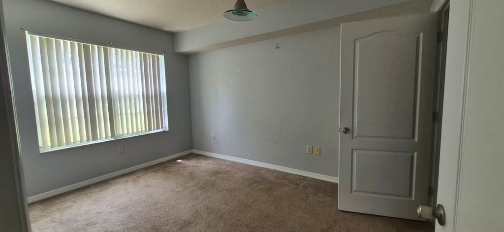 Photo of 138 SW Peacock Boulevard #107, Port Saint Lucie, FL 34986 (MLS # B26035941)