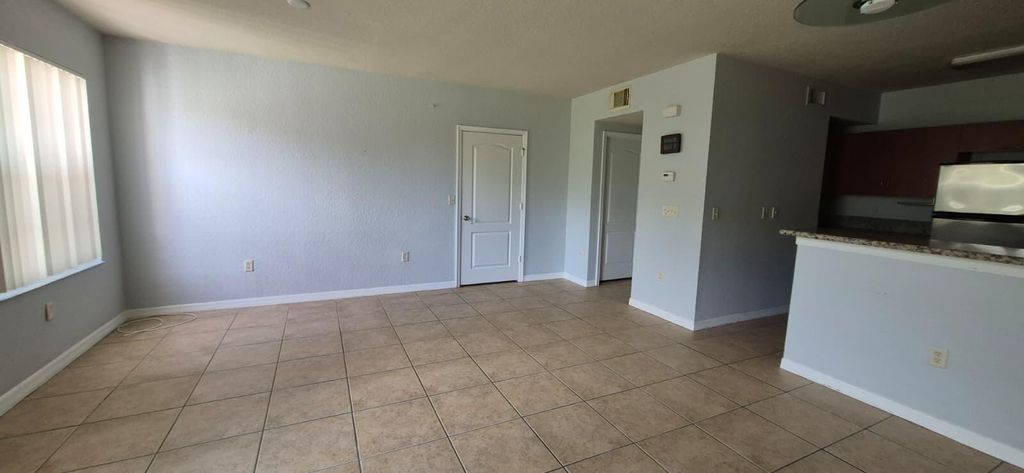 Photo of 138 SW Peacock Boulevard #107, Port Saint Lucie, FL 34986 (MLS # B26035941)