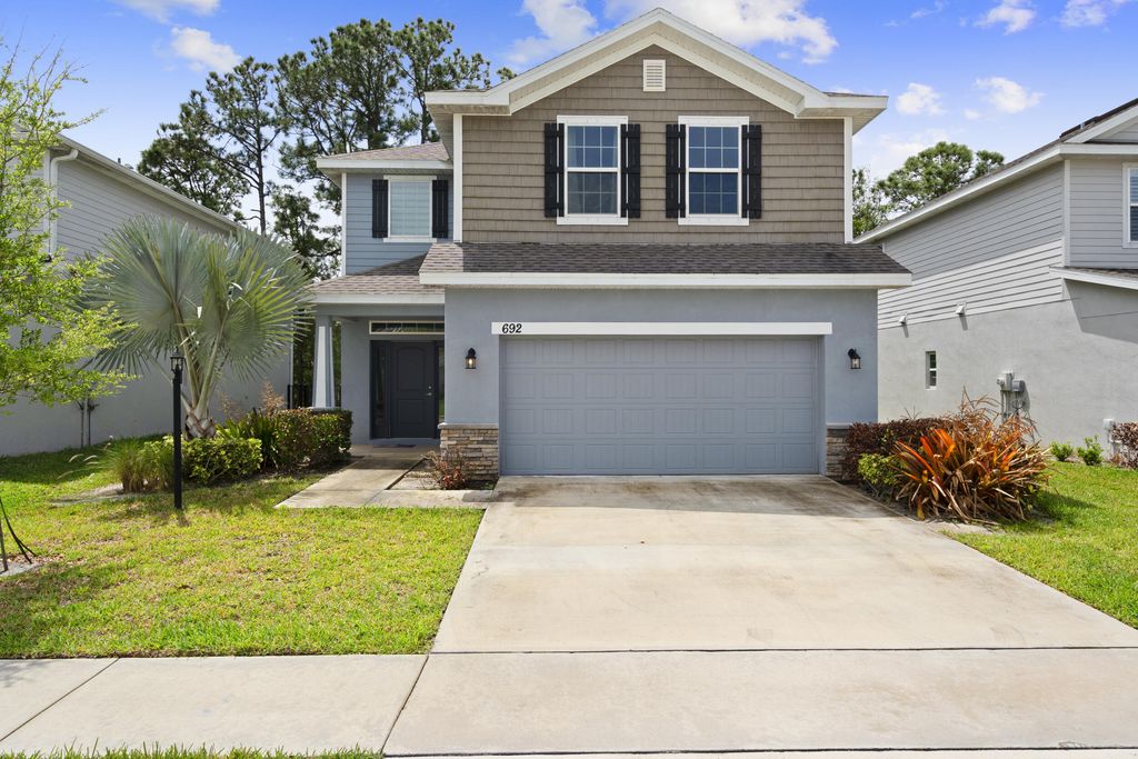 Photo of 692 NE Turtleback Trail, Port Saint Lucie, FL 34983 (MLS # B26020364)
