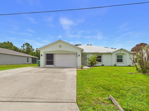 Photo of 2265 SW Grosspoint Street, Port Saint Lucie, FL 34953 (MLS # B26044384)