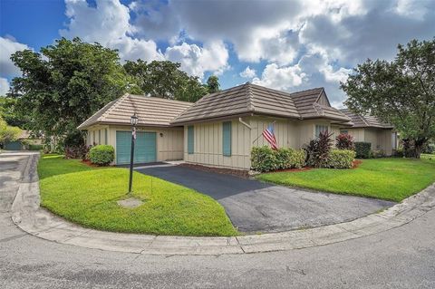 Photo of 1910 Coquina Way, Coral Springs, FL 33071 (MLS # F10538242)