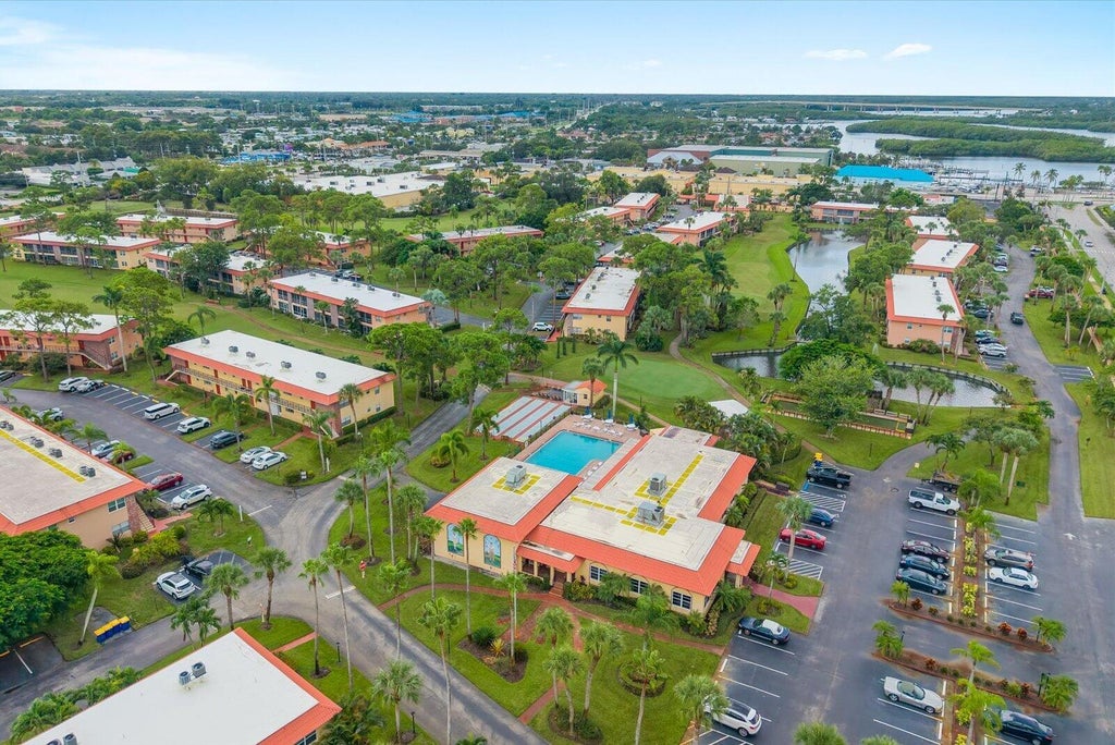 Photo of 1909 SW PALM CITY Road #H, Stuart, FL 34994 (MLS # B26079042)