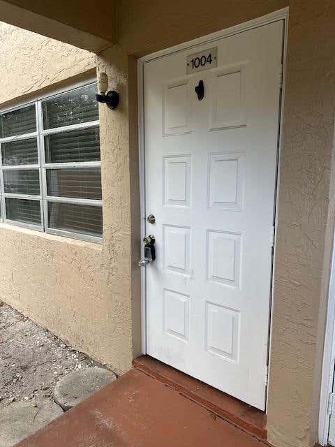 Photo of 1004 Twin Lakes Drive, Coral Springs, FL 33071 (MLS # B26060289)