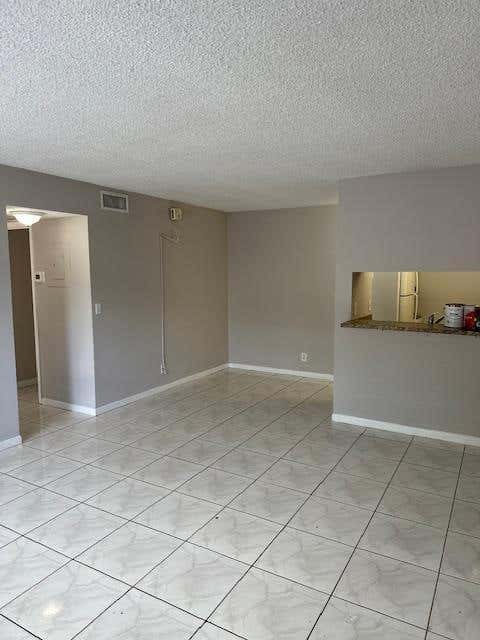 Photo of 1004 Twin Lakes Drive, Coral Springs, FL 33071 (MLS # B26060289)