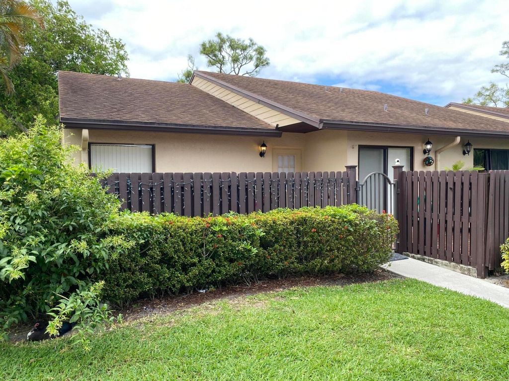 Photo of 604 Sea Pine Way #A, Greenacres, FL 33415 (MLS # B26019857)