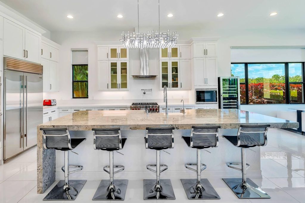 Photo of 9219 Grand Prix Lane, Boynton Beach, FL 33472 (MLS # R11092408)