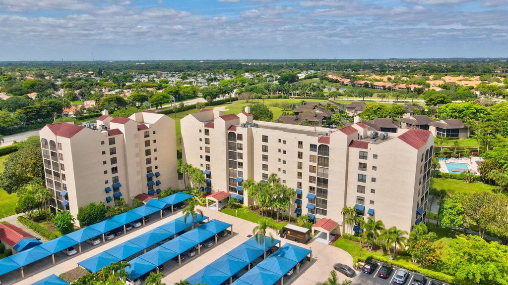Photo of 7578 Regency Lake Drive #702, Boca Raton, FL 33433 (MLS # R11088069)