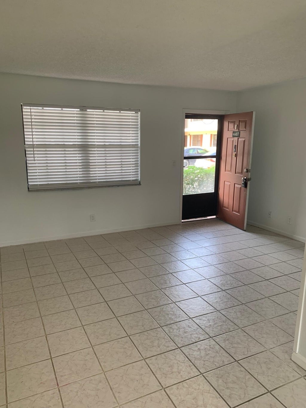 Photo of 4467 OAK TERRACE Drive, Greenacres, FL 33463 (MLS # B26079516)