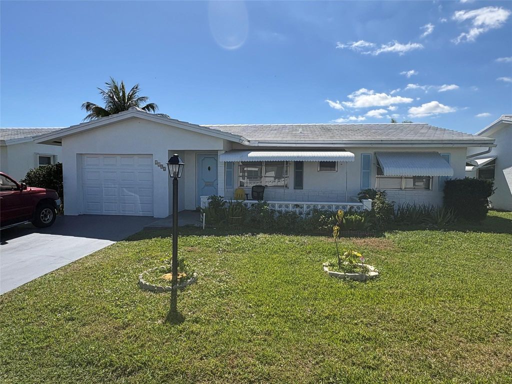 Photo of 2392 SW 13th Terrace, Boynton Beach, FL 33426 (MLS # F10556114)
