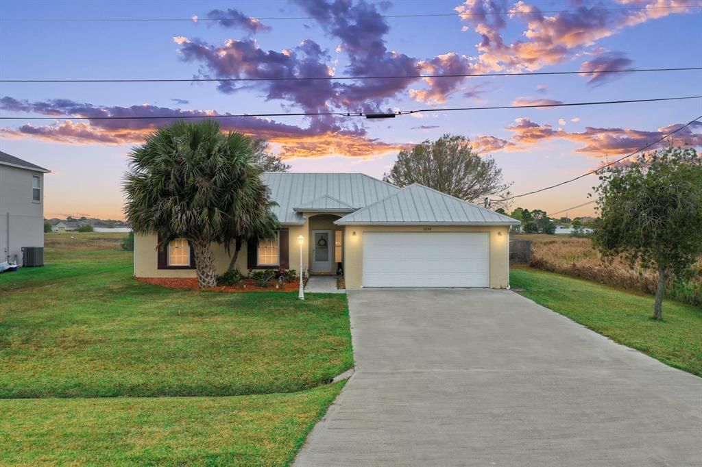 Photo of 5844 NW Mesa Circle Cir, Port St Lucie, FL 34986 (MLS # R10694180)