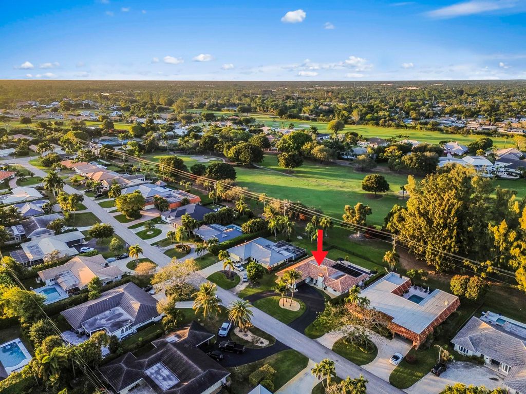 Photo of 220 Walton Heath Drive, Atlantis, FL 33462 (MLS # R11158894)