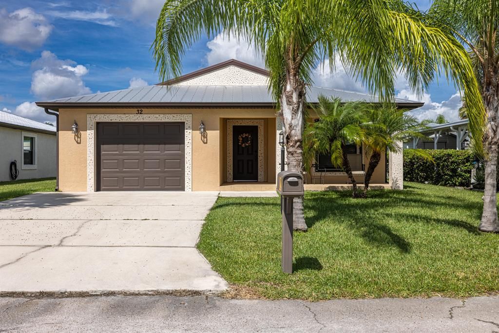 Photo of 32 Monterey Way, Port St Lucie, FL 34952 (MLS # R10880296)