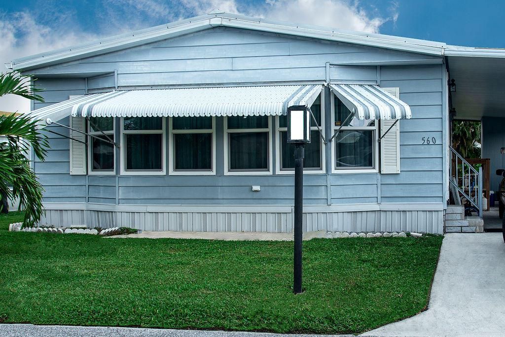 Photo of 560 Barb Ann Lane, Fort Pierce, FL 34952 (MLS # R10663419)