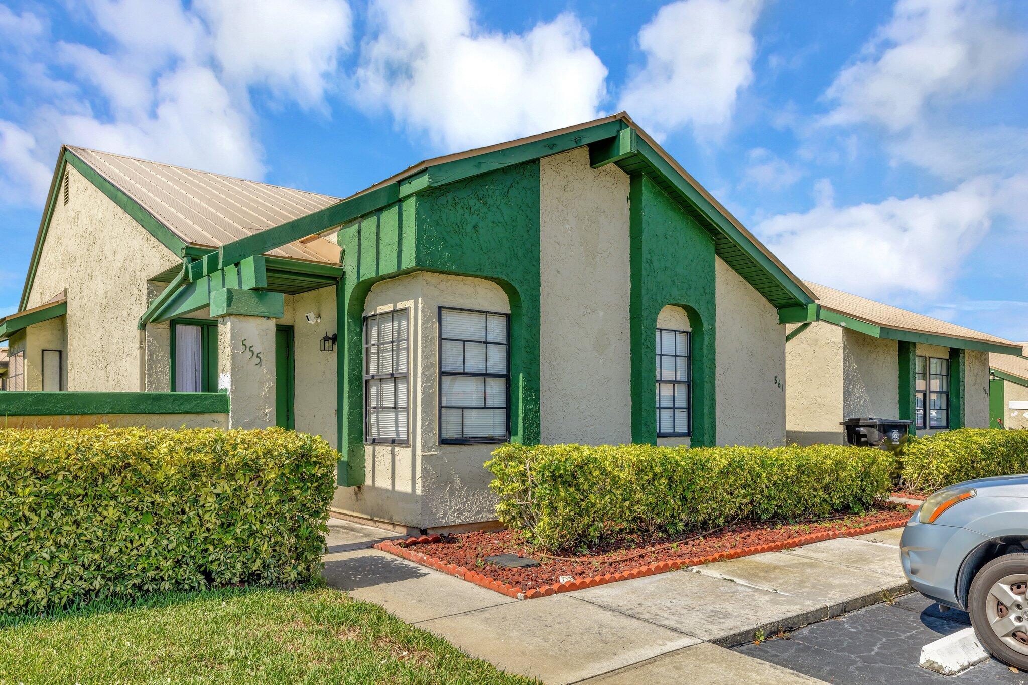 Great opportunity for a corner 3-bedroom, 2-bath unit. The comfortable split floor plan offers a spacious layout with a private patio and storage room. Features include a new metal roof, granite countertops, tile throughout, new appliances and an in-unit laundry room. Located in a pet- and rental-friendly community with a pool, this property combines modern living with investment potential in a prime location in the heart of Port Saint Lucie. Walking distance to parks, gym, shops, grocery stores & restaurants.