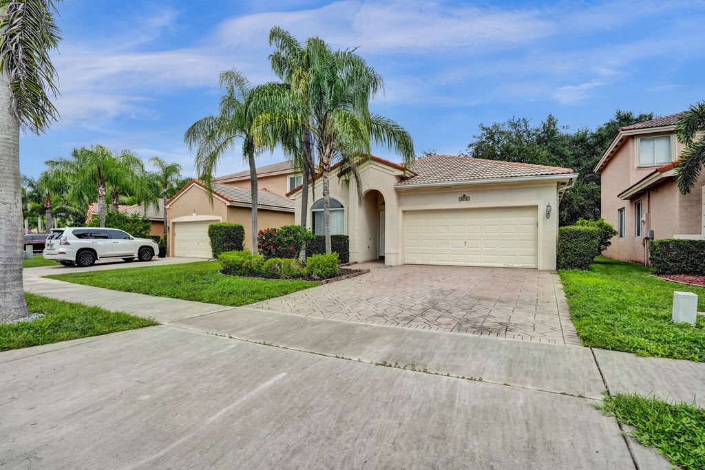 Photo of 3717 Pebblebrook Manor, Coconut Creek, FL 33073 (MLS # B26038094)