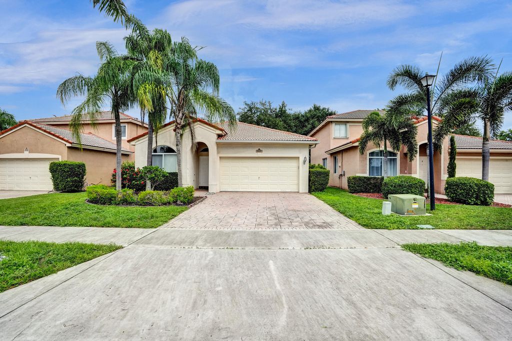 Photo of 3717 Pebblebrook Manor, Coconut Creek, FL 33073 (MLS # B26038094)