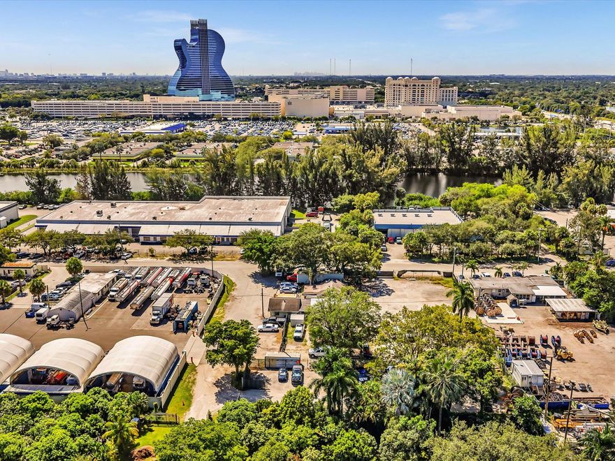 This property is currently zoned as A-1 but we have spoken with the city and they have advised that M-2 should not be a challenge as the property has a business that has been operating out of there since 2009 and the surrounding area is all industrial. This property is perfect for commercial business who need office space and plenty of room to park their work vehicles. The property has two buildings on it. The first building has 4 offices, one full bathroom and a kitchen. The second building is a 3 bedroom, 2 bathroom with a kitchen. This is perfect for employees to get ready, shower and change after a long work day. Request showing through ShowingTime