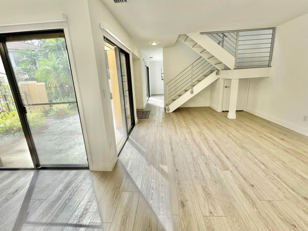 Photo of 359 Prestwick Circle #2, Palm Beach Gardens, FL 33418 (MLS # R10952526)