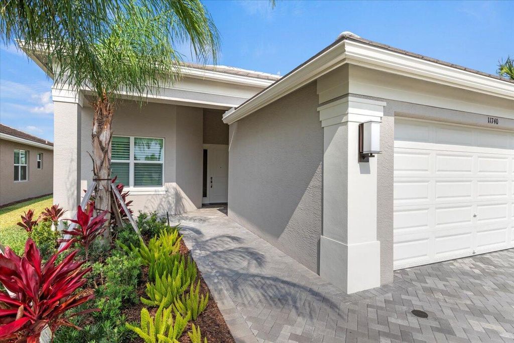 Photo of 11740 SW Moon River Way, Port Saint Lucie, FL 34987 (MLS # R10987831)