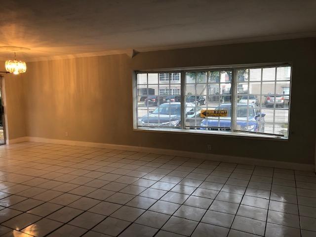 Beautifully updated 3-bedroom, 2-bathroom apartment on the 1st floor featuring a spacious floor plan and tile flooring throughout all living areas. Modern kitchen with wood cabinets, granite countertops, and updated bathrooms with granite vanities. This freshly painted unit includes new blinds, ceiling fans in all bedrooms, a walk-in closet, and an impact bay window. Washer/dryer hookup available. Convenient parking right in front of the property for your convenience. Ready to be occupied on September 1st, 2025.-----HOUSING VOUCHER WELCOME.