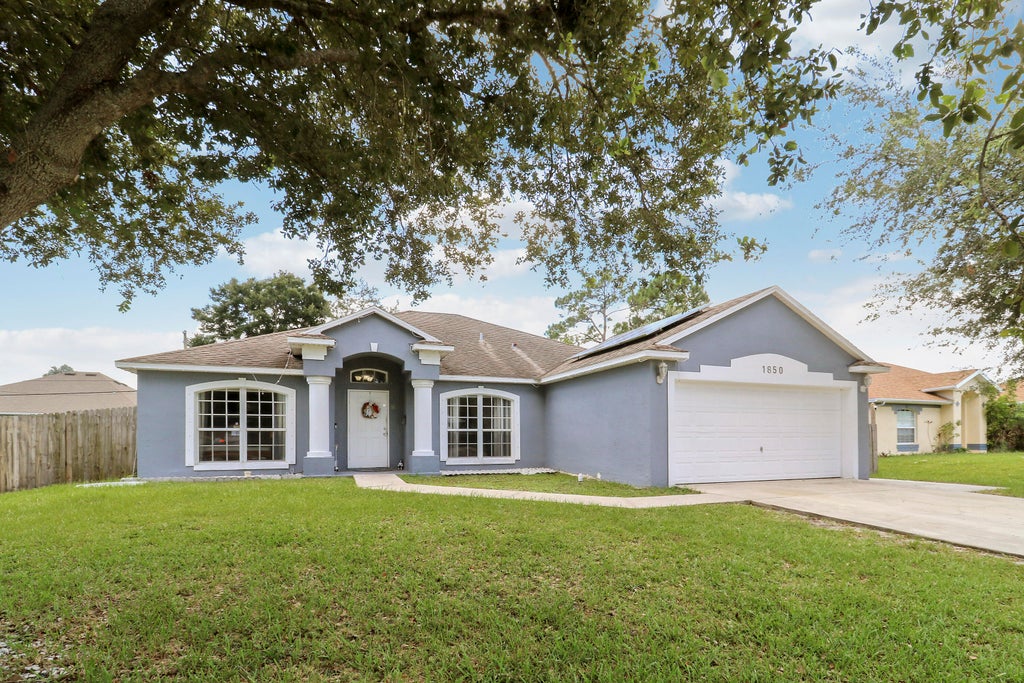 Photo of 1850 SW ALTMAN Avenue, Port Saint Lucie, FL 34953 (MLS # B26063679)