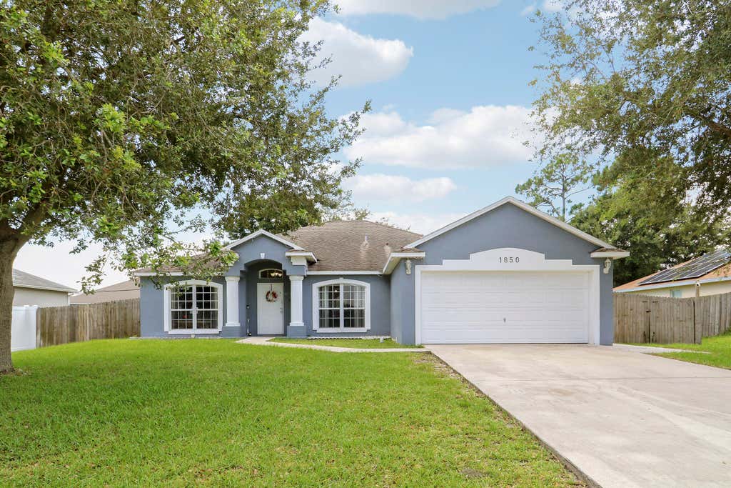 Photo of 1850 SW ALTMAN Avenue, Port Saint Lucie, FL 34953 (MLS # B26063679)