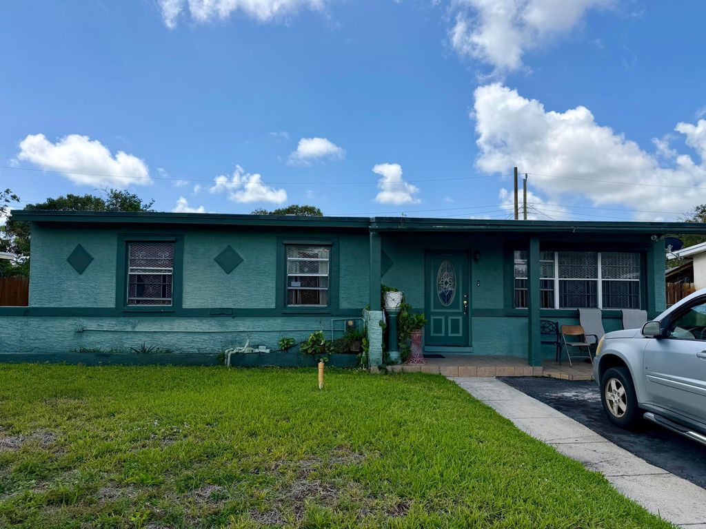 Photo of 1004 NW 12th Street, Fort Lauderdale, FL 33311 (MLS # B26014408)