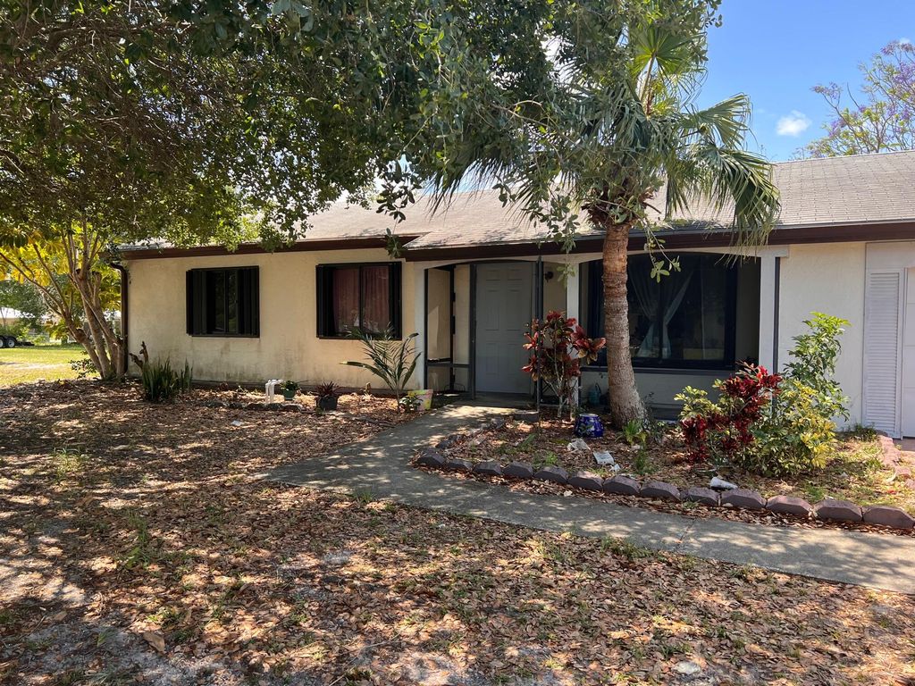 Photo of 2080 SE Triumph Road, Port Saint Lucie, FL 34952 (MLS # R10794198)