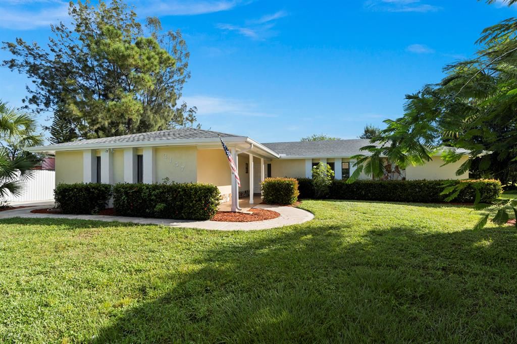 Photo of 2157 SE Morningside Boulevard, Port Saint Lucie, FL 34952 (MLS # R10753697)