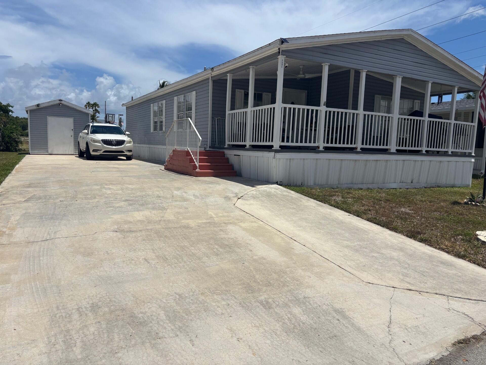 BEAUTIFULL AND SPACIOUS HOME WITH 3 BR'S, 2 BATH'S AND A LARGE ENCLOSED PORCH. HIGHLAND VILLAGE IS A NO AGE RESTRICTION COMMUNITY CLOSE TO THE DESIRABLE BEACH OF DEERFIELD BEACH. LOT RENTAL $1,094 INCLUDING WATER AND SEWER AND TAXES. BASE RENT IS $978.00CALL TODAY FOR AN APPOINTMENT. IT WON'T LAST!!!