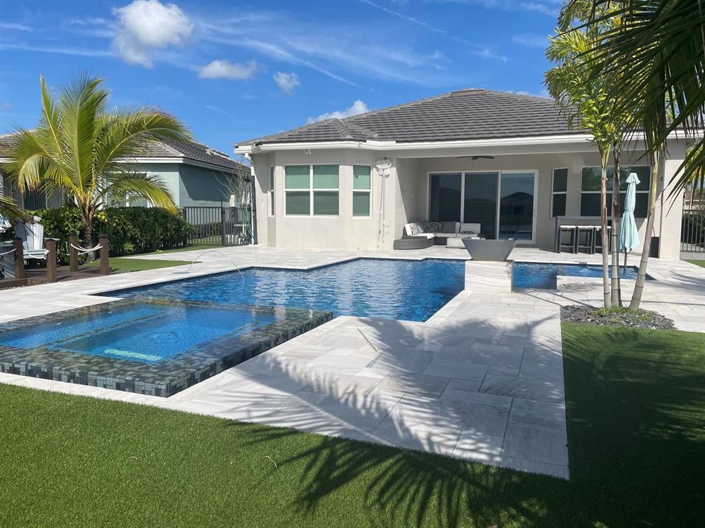 Photo of 16044 Rain Lilly Way Way, FL 33470 (MLS # R10700810)