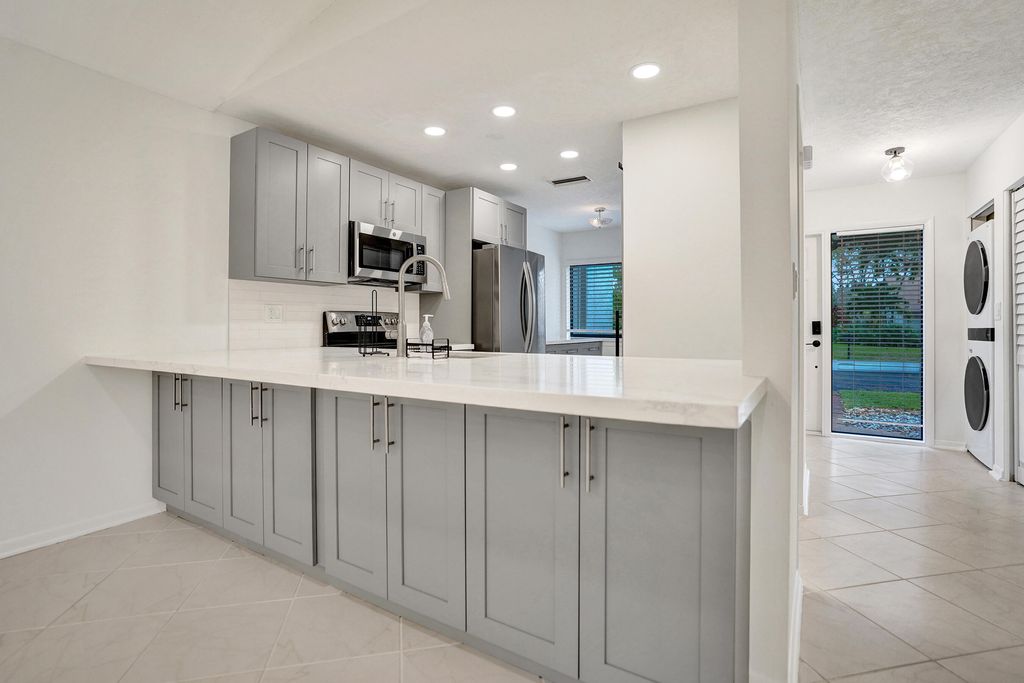 Photo of 3817 Arelia Drive S, Delray Beach, FL 33445 (MLS # R11161424)