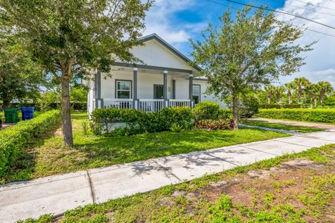 Photo of 313 W 13th St, Riviera Beach, FL 33404 (MLS # F10517617)
