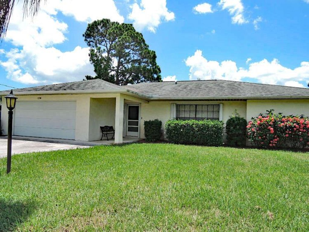 Photo of 1298 SE Mendavia Avenue, Port Saint Lucie, FL 34952 (MLS # R10734028)