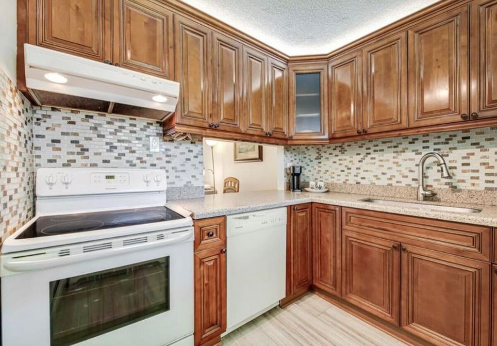 Photo of 2855 Garden Drive S #102, Lake Worth Beach, FL 33461 (MLS # B26029698)