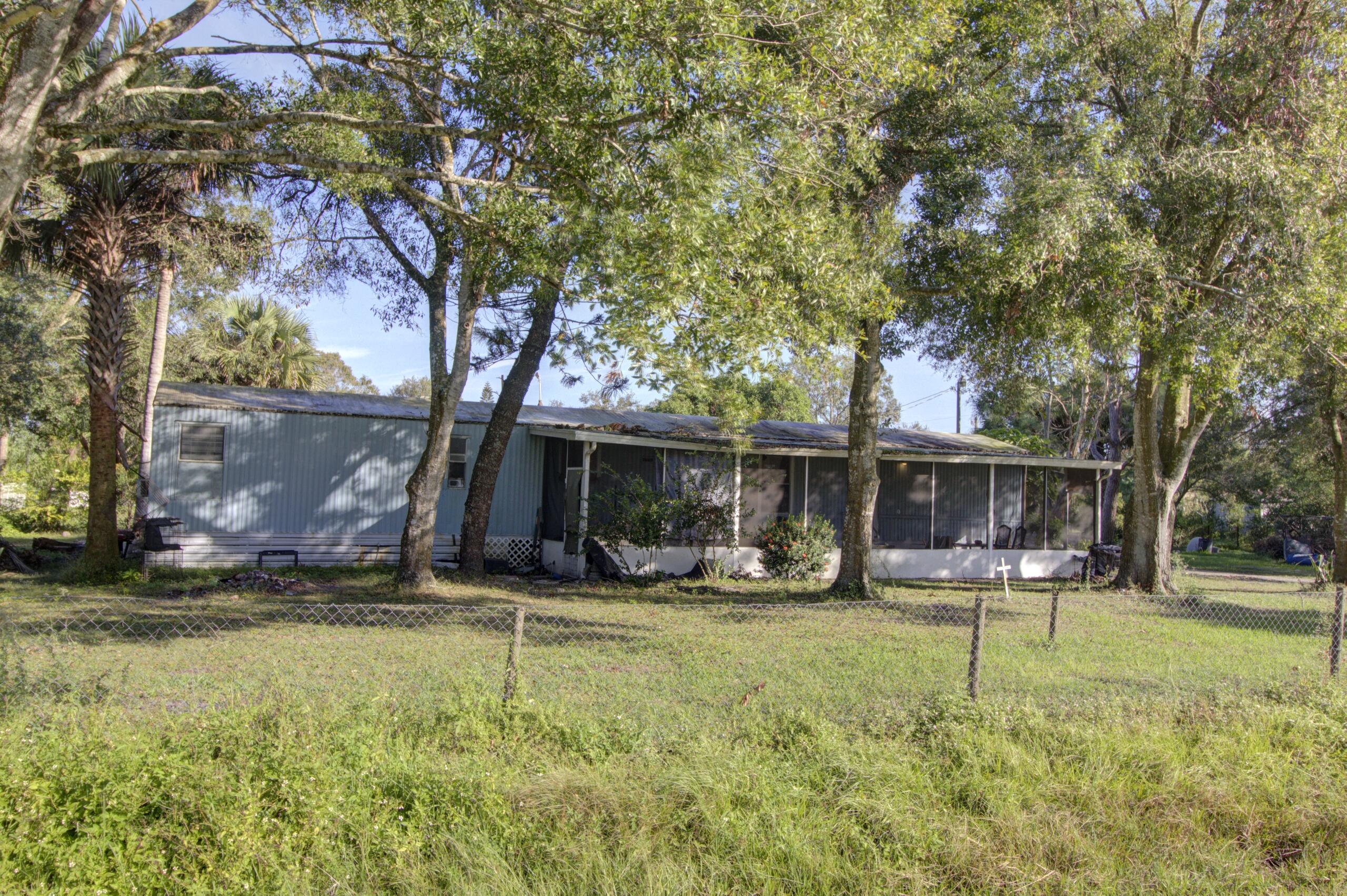 6055 NE 9th Way