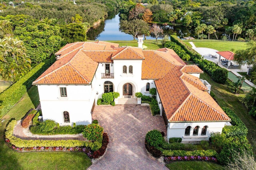 Photo of 5603 Whirlaway Road, Palm Beach Gardens, FL 33418 (MLS # R11058866)