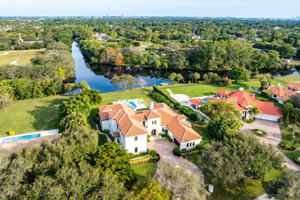 Photo of 5603 Whirlaway Road, Palm Beach Gardens, FL 33418 (MLS # R11058866)